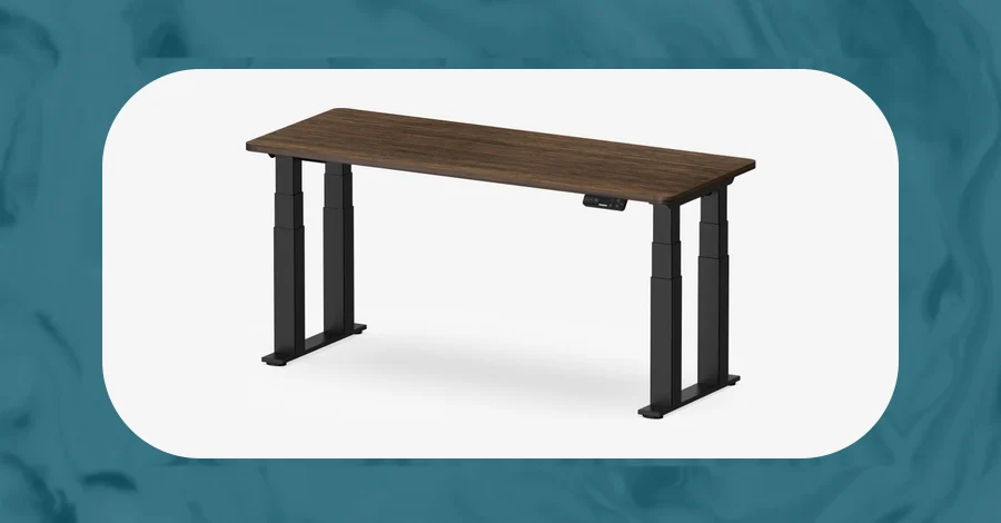 FlexiSpot E7 Plus four-leg standing desk with a walnut-look top