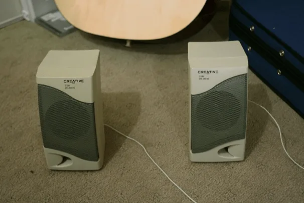Beat-up old speakers used for DIY distortion re-amplification