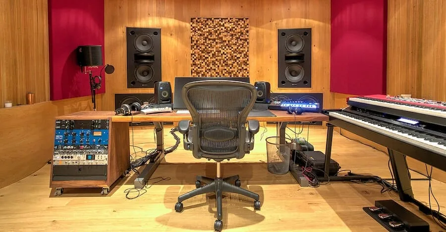 Zedd's home studio, monochromatic wood tones with vibrant pops of color