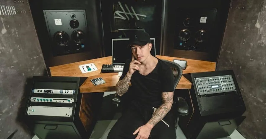 Headhunterz's studio, industrial, compact setup with custom desk