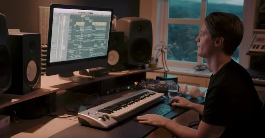 Kygo's studio, classic bedroom producer setup with window for sanity