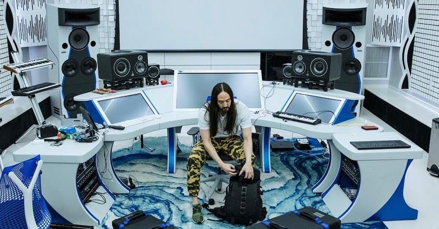 Steve Aoki's studio, calm blue tones with modern aesthetics and a statement carpet
