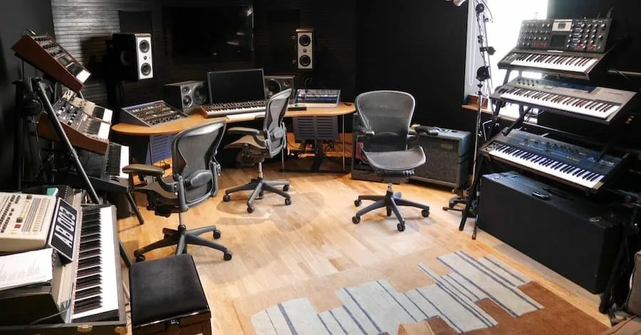 Above & Beyond's studio, utilitarian and cozy, a reminder that less is more