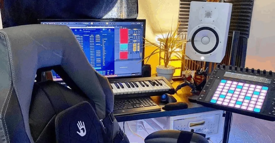 Jaxon Fogg's studio, tight space with all essentials within arm's reach and a Sub-Pac setup