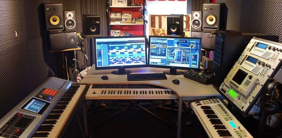 Facebook gear studio, impressive speaker collection with no clear way to reach the back ones