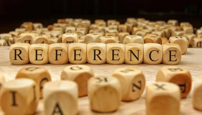 Scrabble tiles spelling out words related to referencing your music