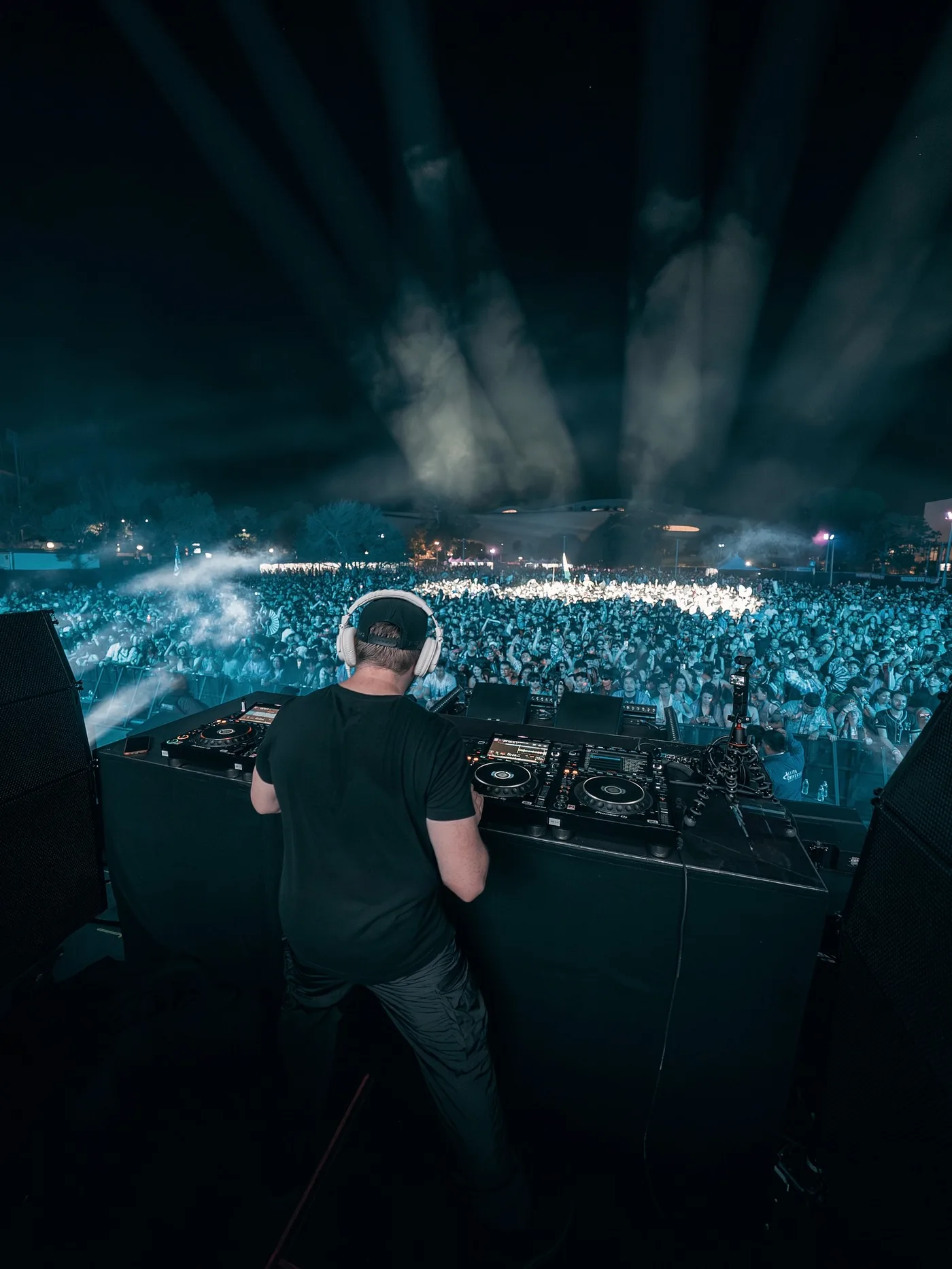 Nurko behind the decks facing a massive crowd